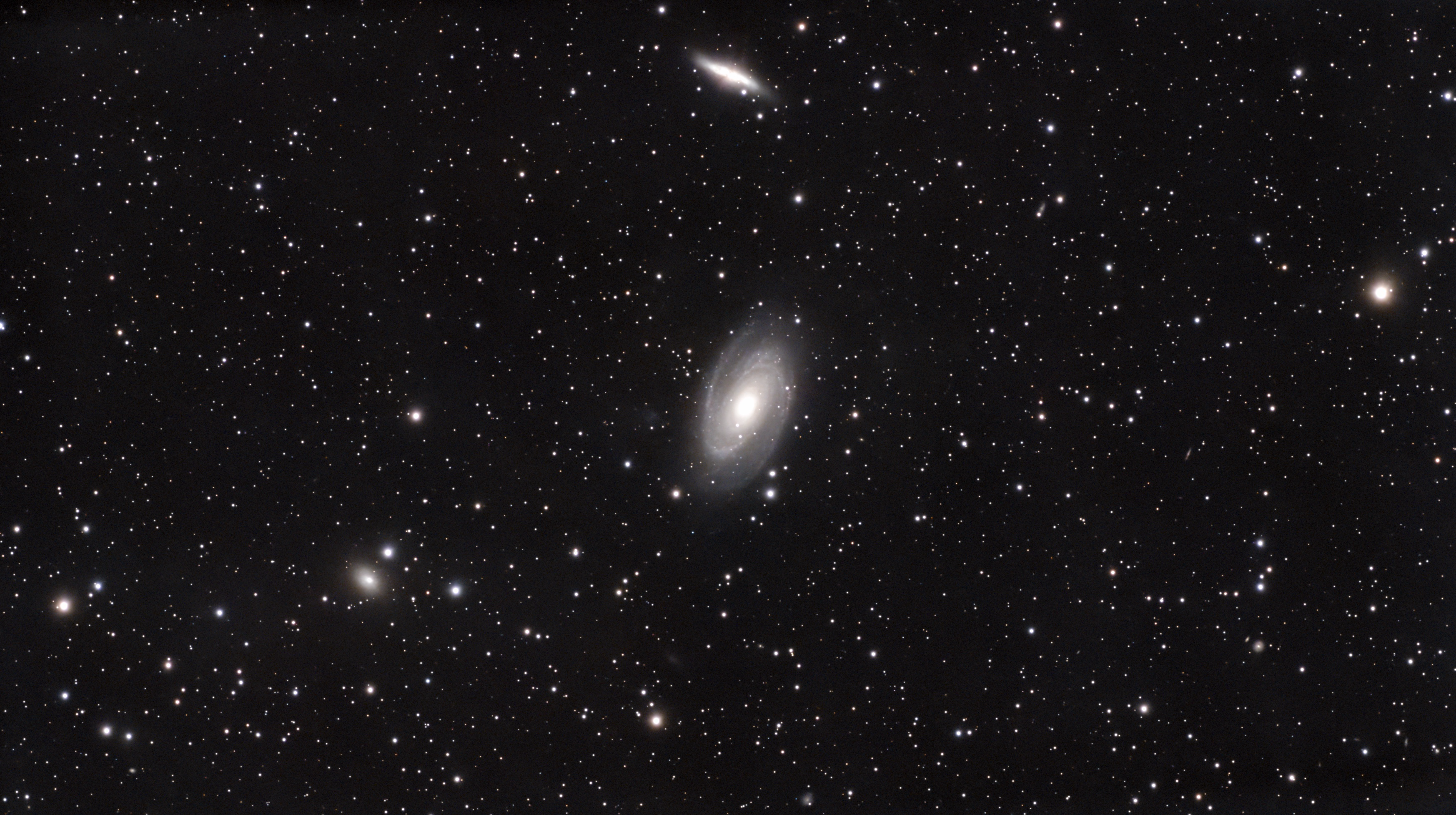 M81 Bodes Galaxy and M82 Cigar Galaxy captured with DWARF 3 smart telescope over 15 hours 14 minutes Astro filter gain 50 Bortle 6 skies moon near full