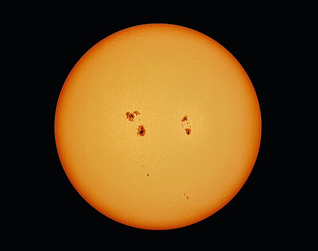 Full solar disk from June 29, 2026 with two large sunspot groups and smaller trailing spots, captured with the DWARF 3 and edited in Snapseed